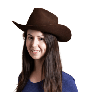 A young woman wearing a cowboy hat appears in an OSS podcast discussing the unique challenges of navigating the chronosphere.