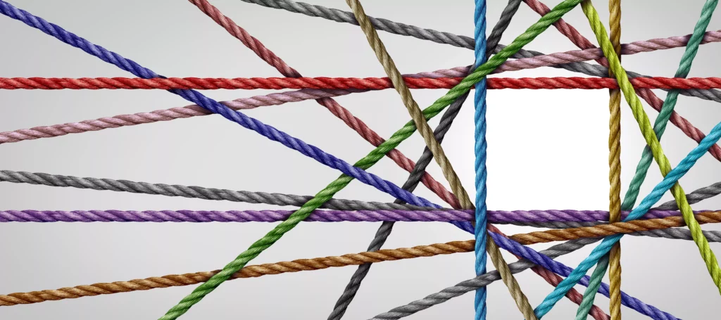 Colorful ropes on a gray background.